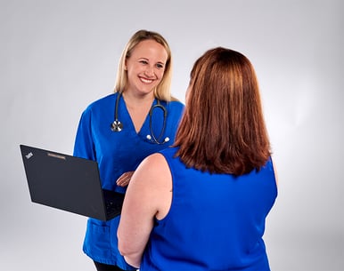 Ob-gyn talking with woman in blue shirt-1